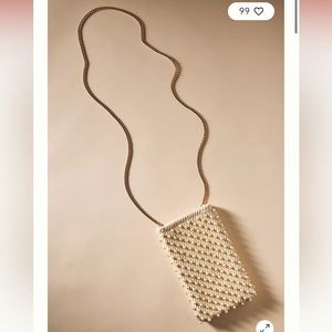 Anthropologie pearl embellished cellphone crossbody bag